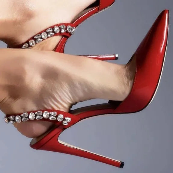 Women's black pointed toe high heel sandals with rhinestone decoration on the side.