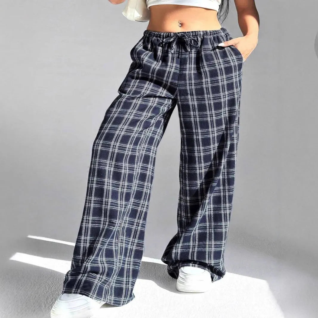 Women's loose-fit plaid trousers with drawstring waist and side pockets in blue or red