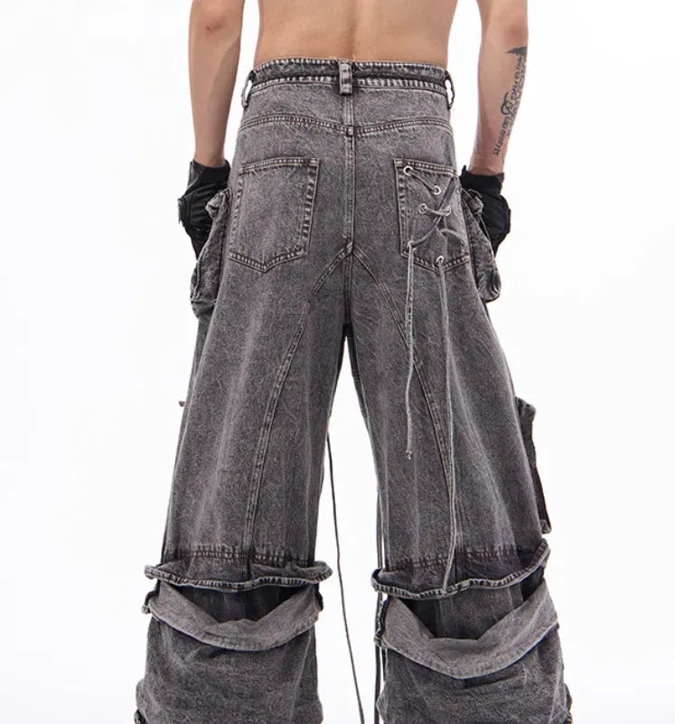 Grey American-style distressed denim overalls with rope stitching on cotton fabric.