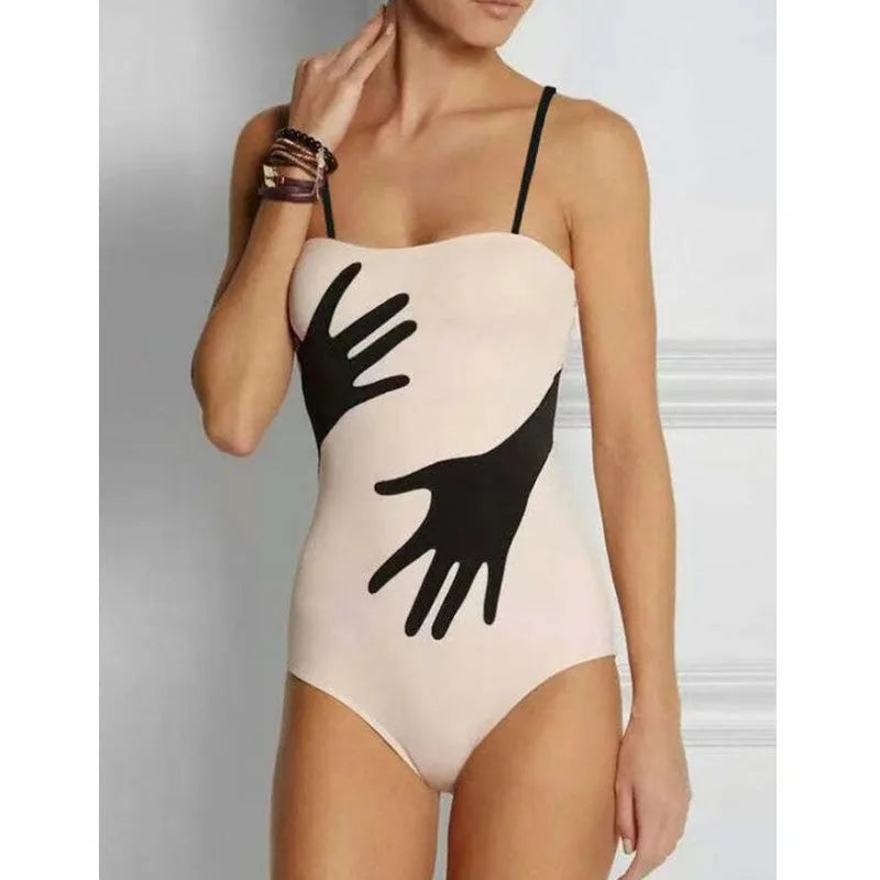 A women's one-piece bikini swimsuit with a gauze skirt, shown in a colour option.