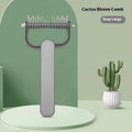 Green and grey dog grooming comb for unknotting hair, shown in large and small sizes
