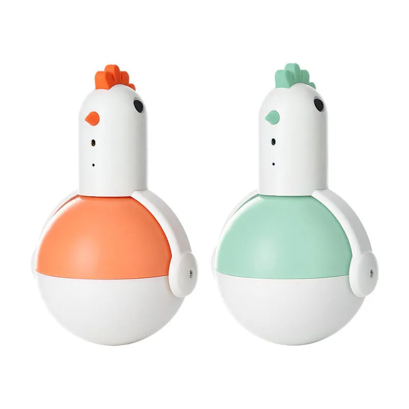 Green or orange electric cat toy chicken with laser and sound features on a flat surface.