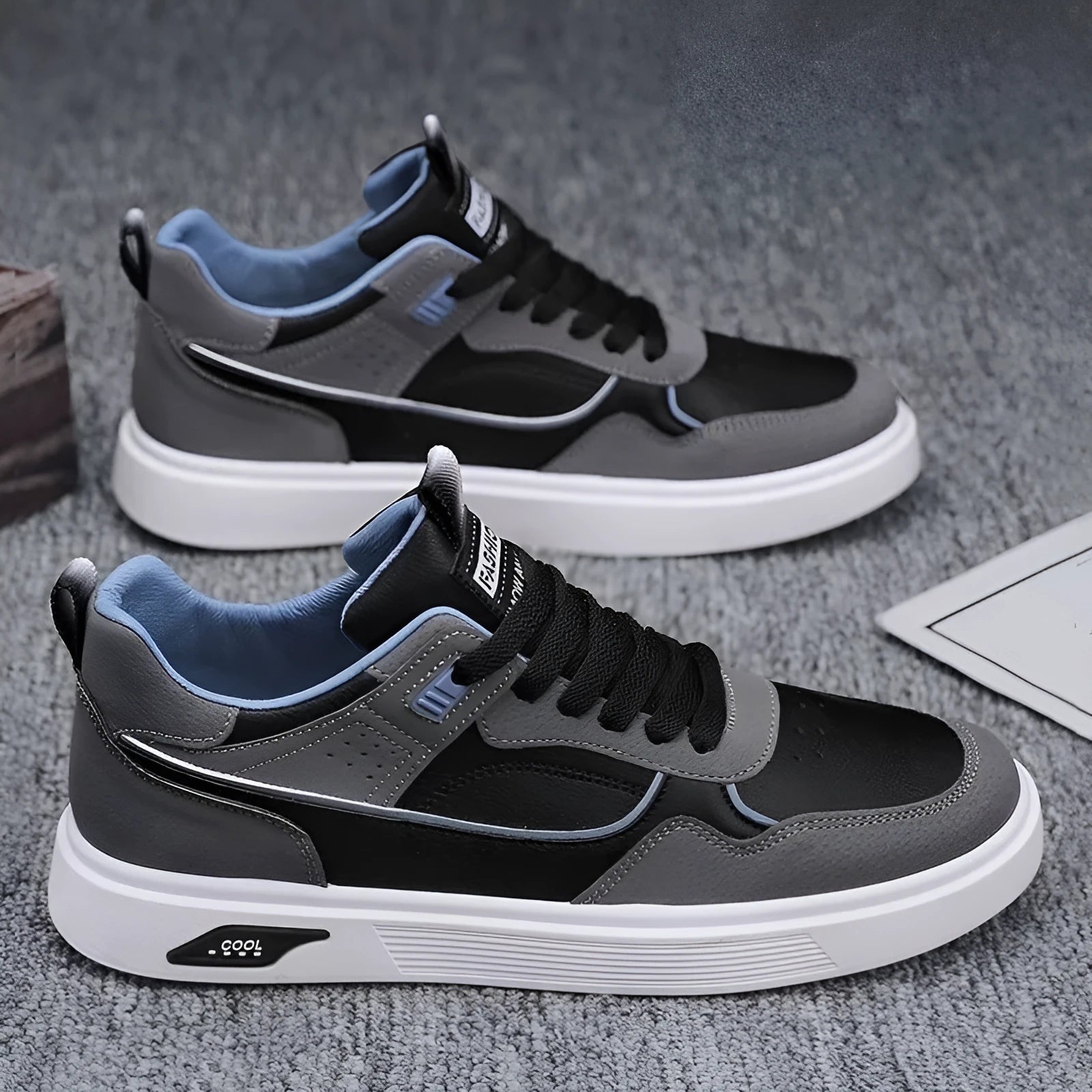 Men's canvas board shoes with mesh lining in black, beige and grey colours showing round toe and flat heel design
