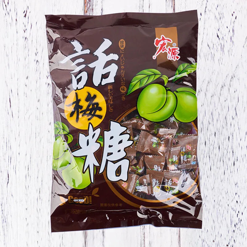 Assorted Chinese fruit flavoured hard candies: guava, plum sugar, and tangerine peel in separate bags.