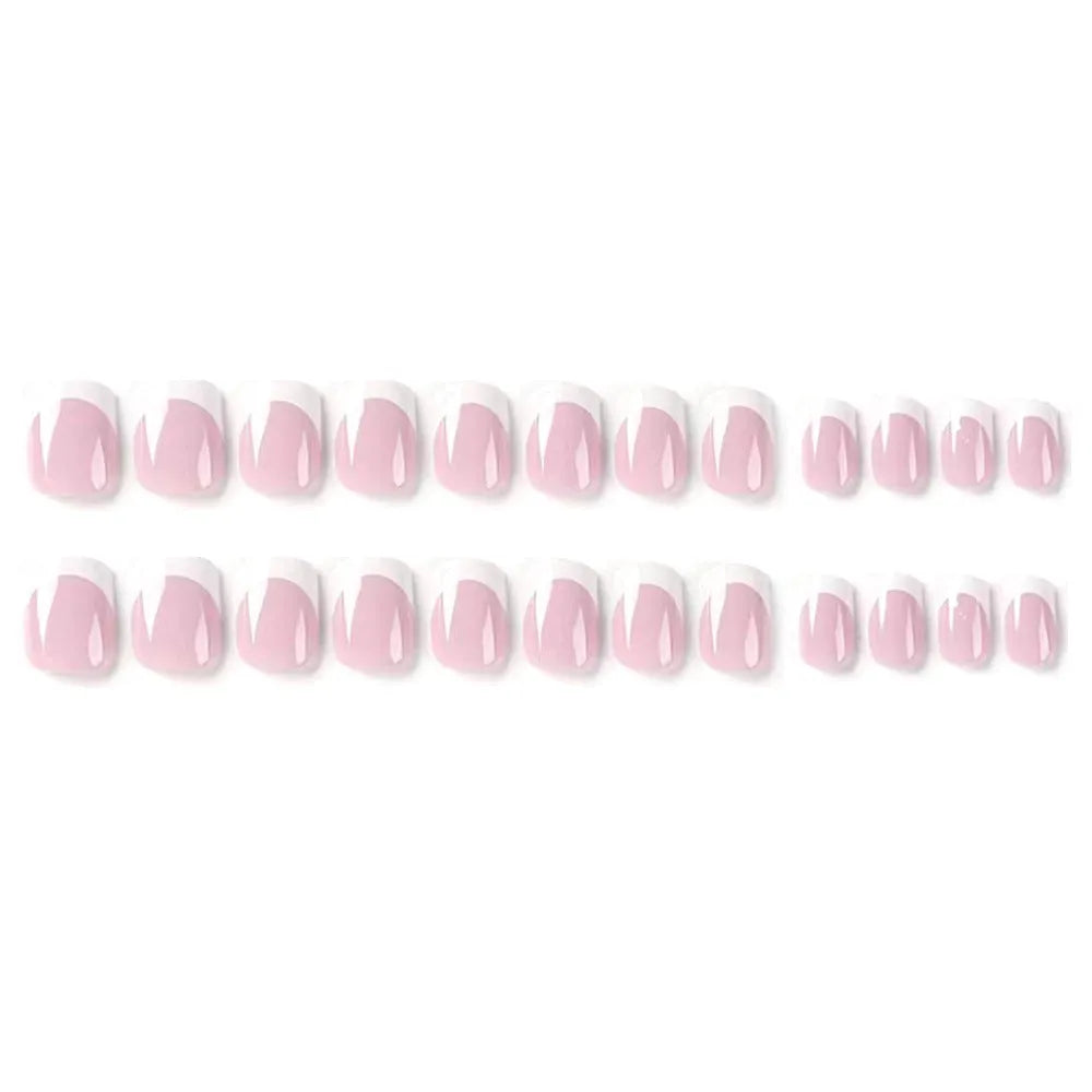 24 white acrylic nail tips with plaid pattern design arranged on display