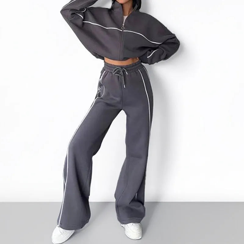 Casual polyester suit with zip hoodie and striped lace-up trousers in apricot colour.