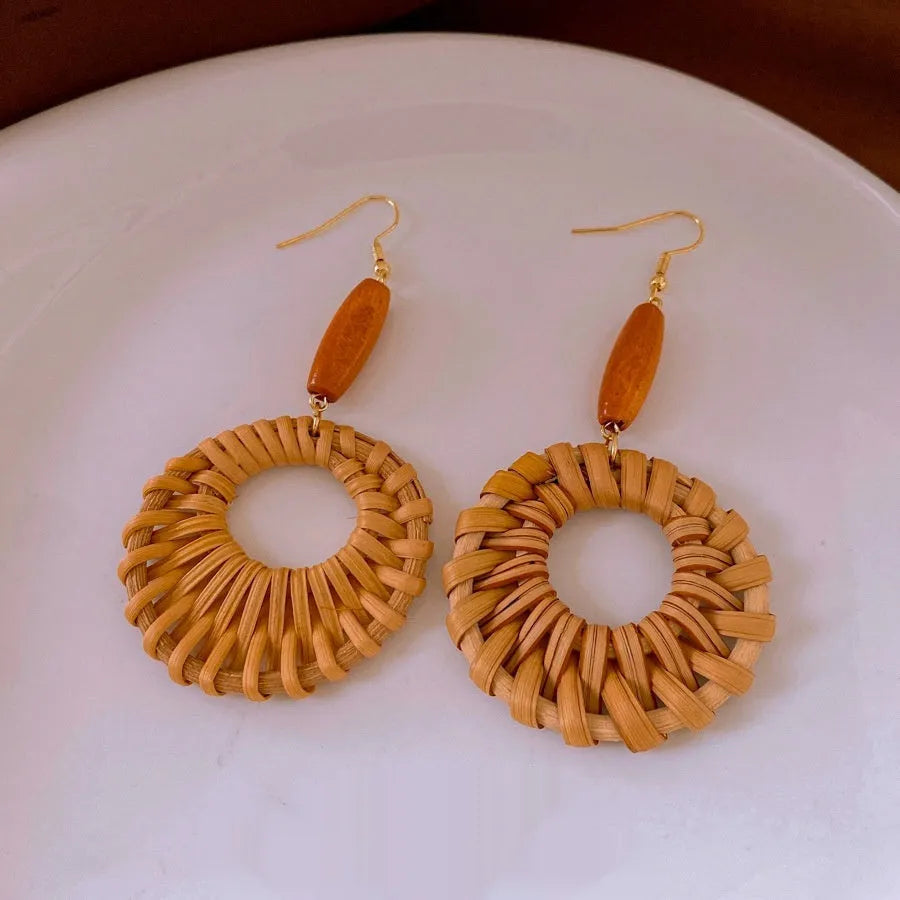 Vintage wooden bead rattan round earrings in brown with hand-woven geometric design