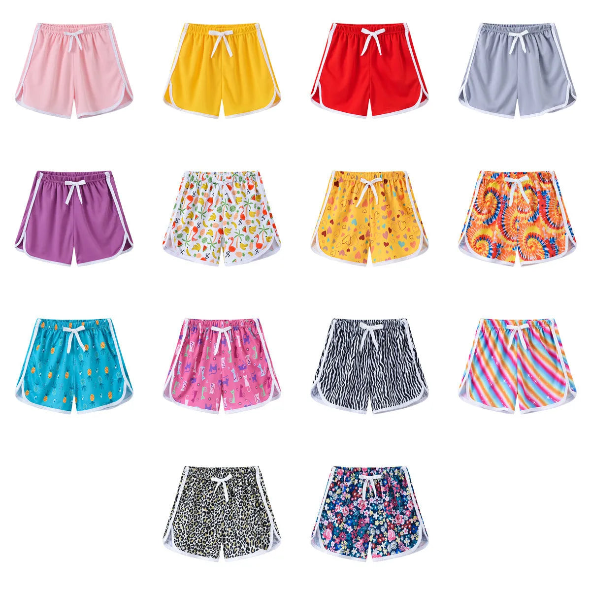 Children's elastic waistband beach shorts in multiple colours and patterns including stripes, florals, and animal prints