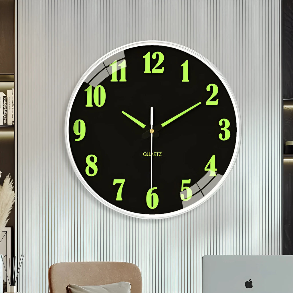 8 inch diameter modern wall clock with luminous hands on a wall.