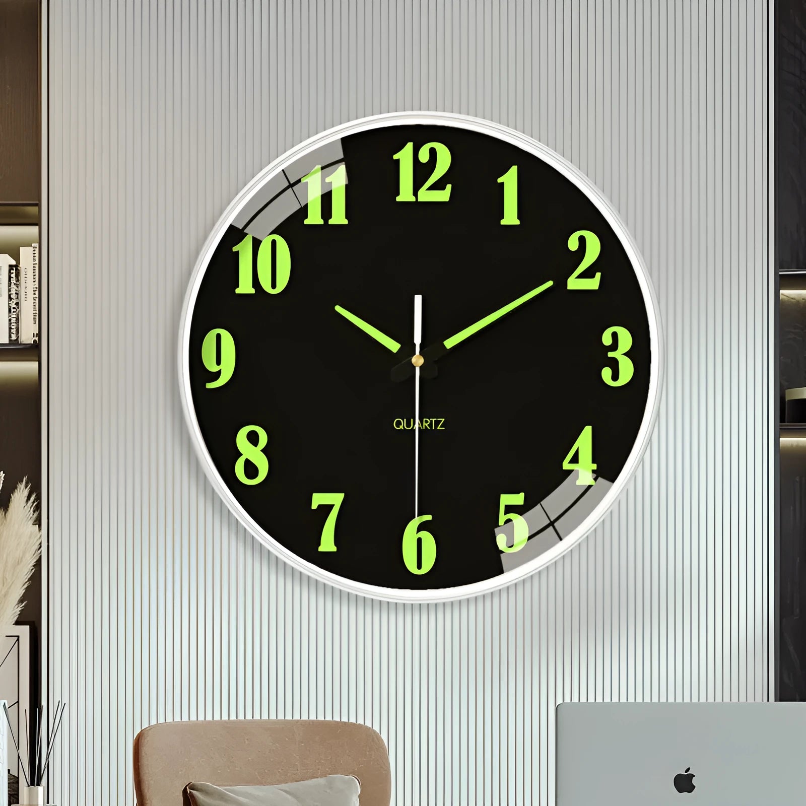 8 inch diameter modern wall clock with luminous hands on a wall.