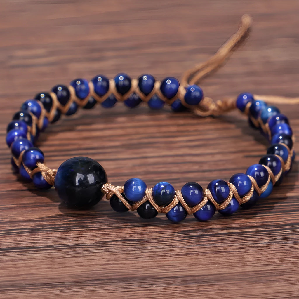 Handmade geometric woven pull bracelet in blue Tigereye stone with visible banding patterns
