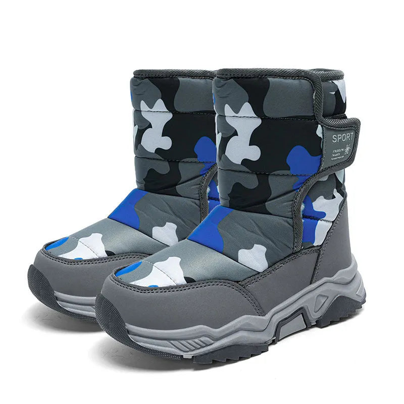 High-top camouflage unisex kids cotton shoes with hook and loop closure on a child