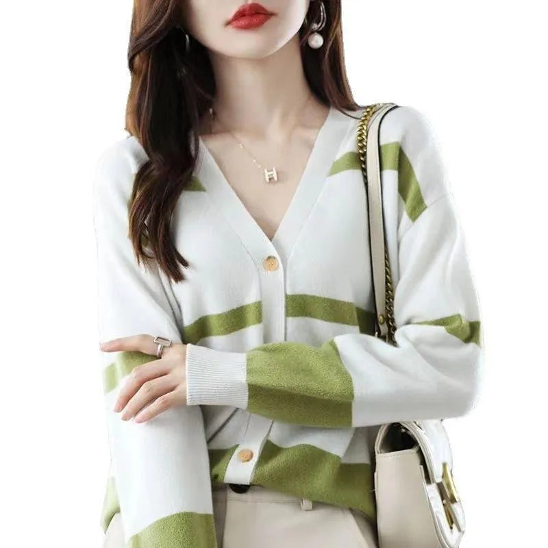 Women's slim fit V-neck cardigan with 3D striped pattern and buttons in four colour options.