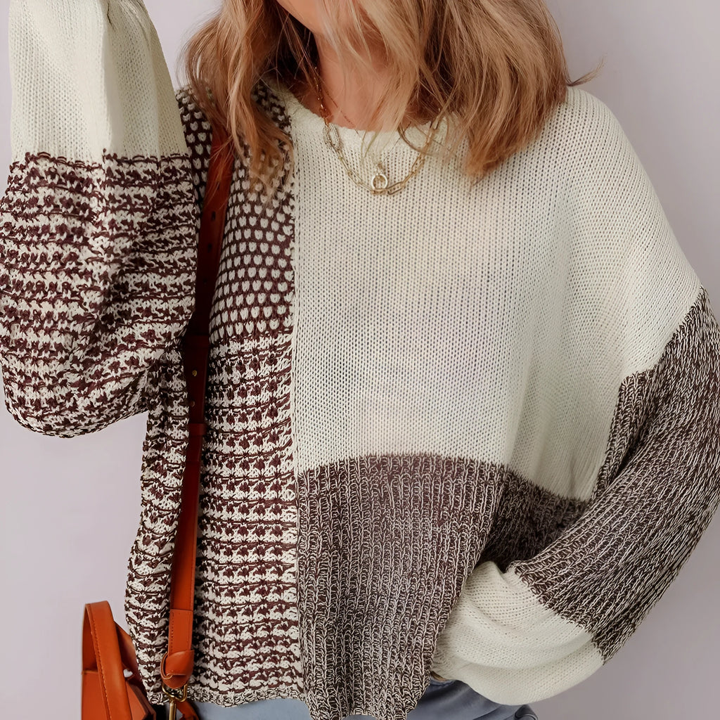 Dark khaki loose knit sweater with drop shoulders and a back tie detail.