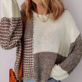 Dark khaki loose knit sweater with drop shoulders and a back tie detail.