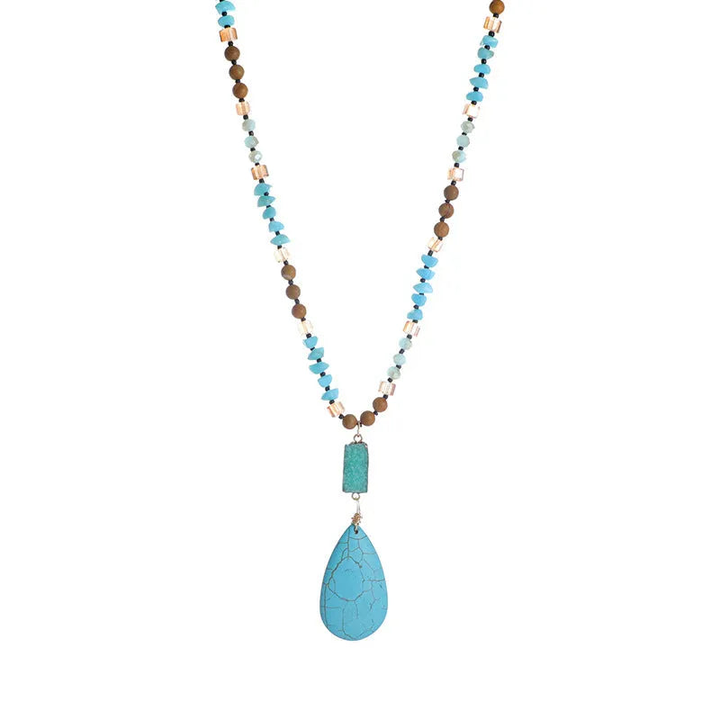 Turquoise blue imitation mineral pendant necklace with mixed gem inlaid details on ball bead chain