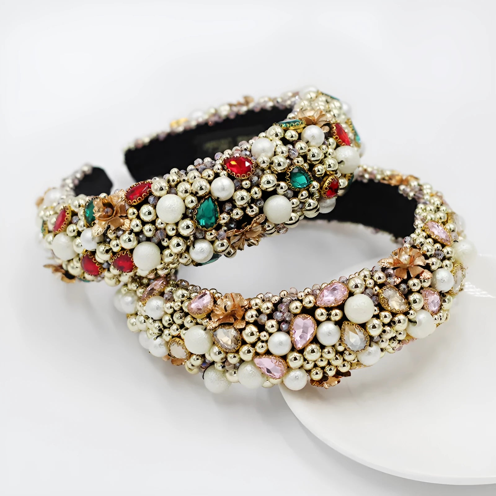 Gold-plated baroque headband with plaid pattern and bow detail on a light background