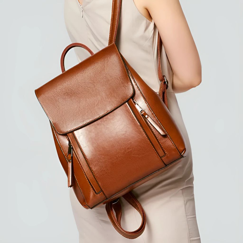 Genuine leather women's backpack large capacity with multiple compartments in black colour