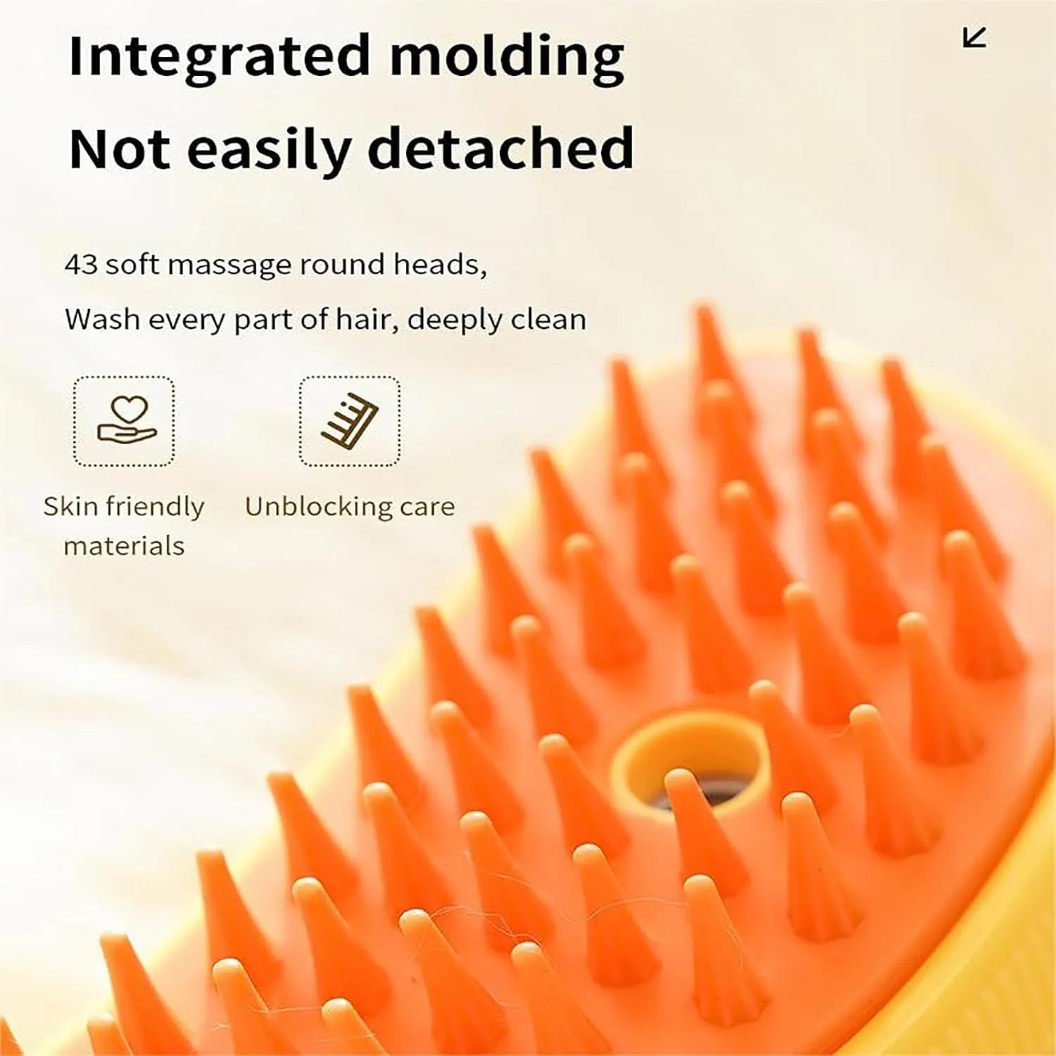 Rechargeable cat steam brush in green or yellow, showing round teeth with cat paw-shaped ends for grooming.