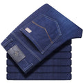Women's stretch denim straight-leg trousers in black or blue available in plus sizes