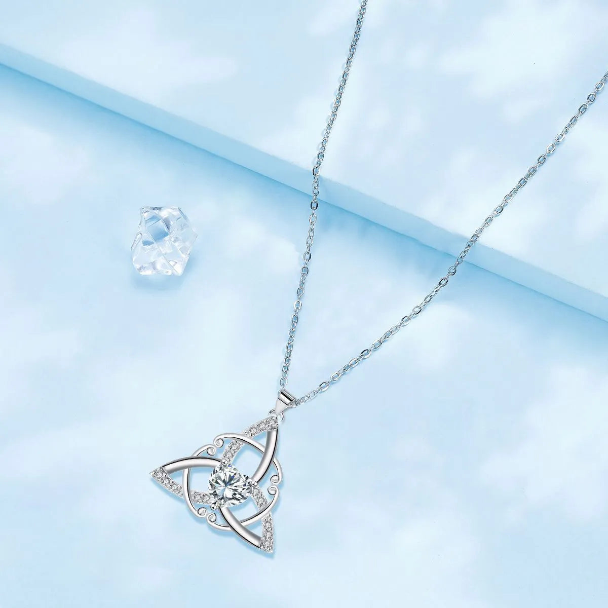Celtic knot geometric pendant necklace in copper with electroplated blue finish for women