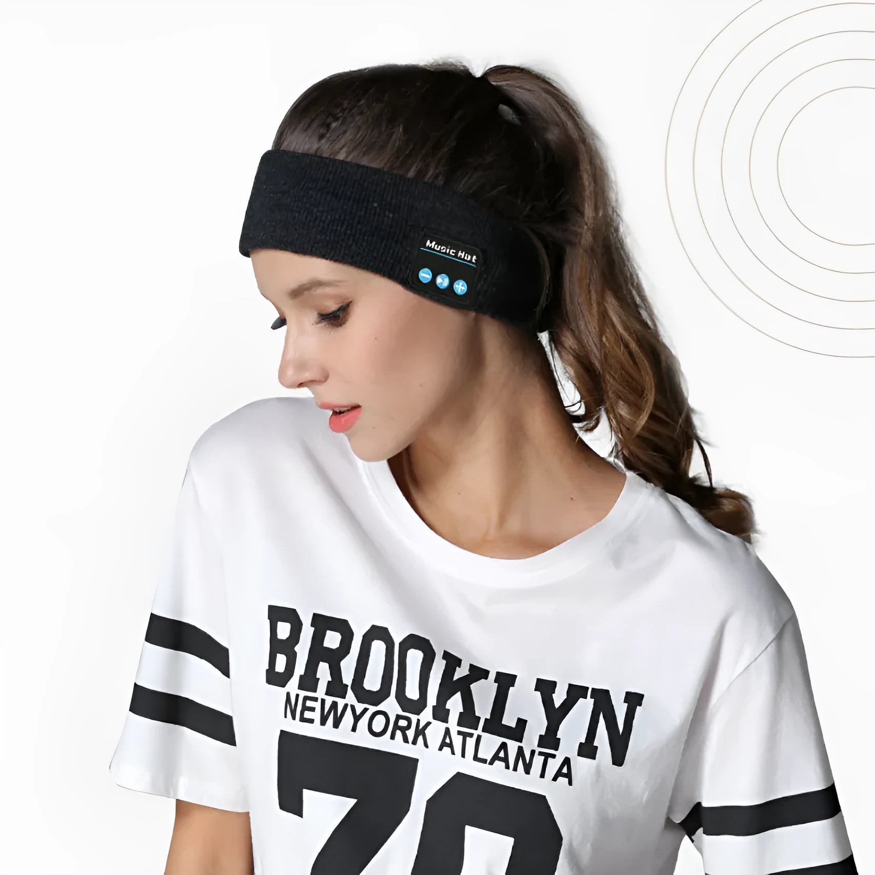 Bluetooth sports headband in black colour with removable washable fabric and wireless audio functionality