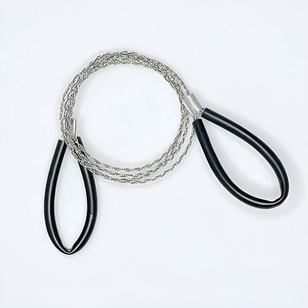 Close-up of a black coiled stainless steel wire survival saw with a total length of 70cm.