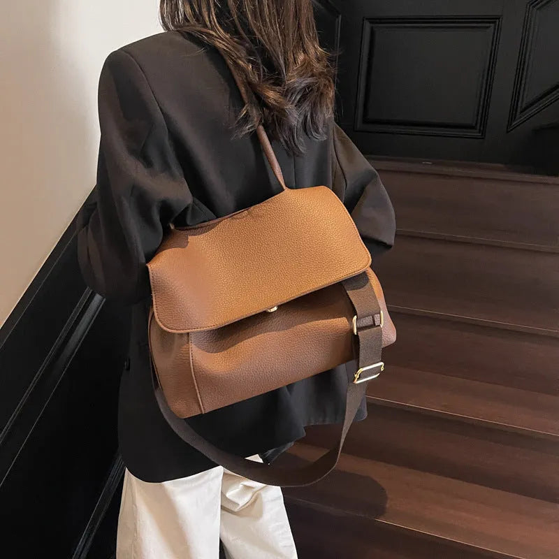 Vintage casual tote bag in horizontal square shape with double shoulder straps and visible sewing thread detailing