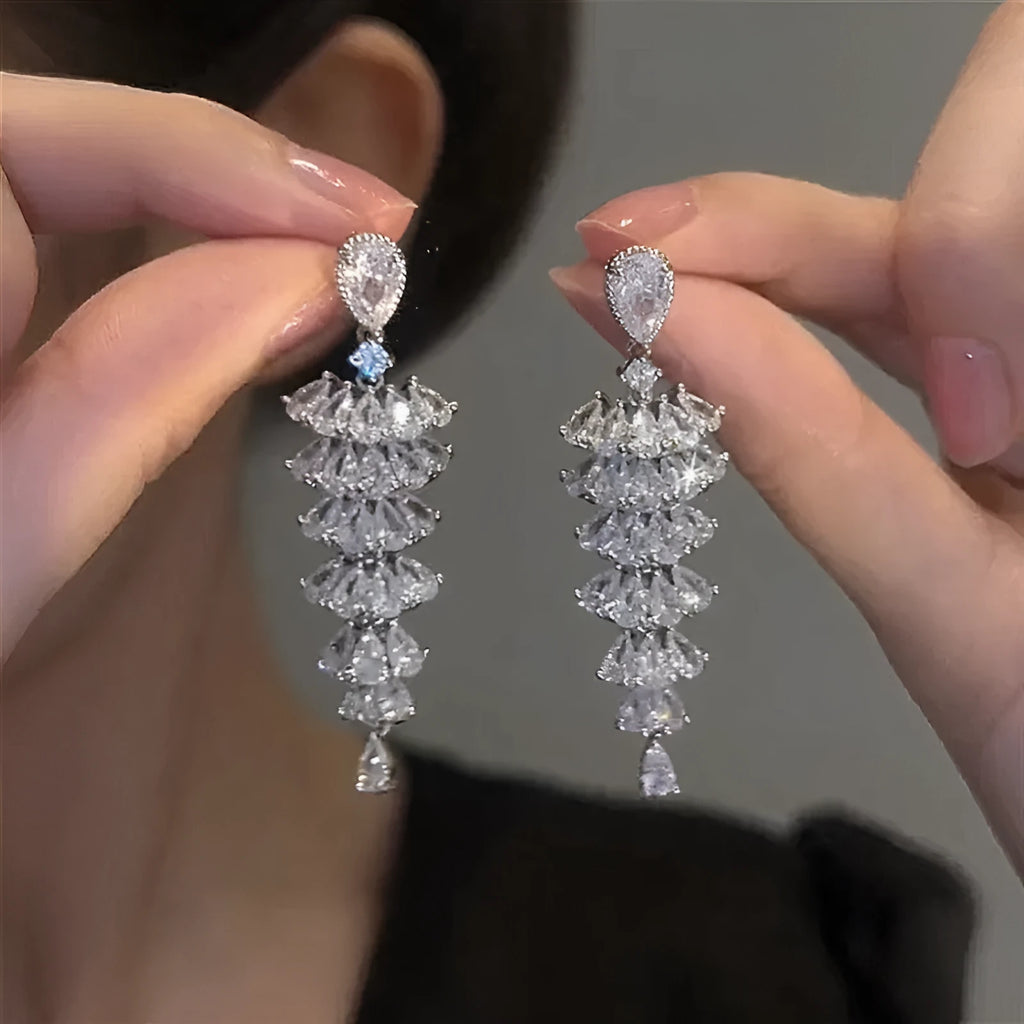 Silver pagoda Christmas tree drop earrings with sparkling zircon detail on copper studs.