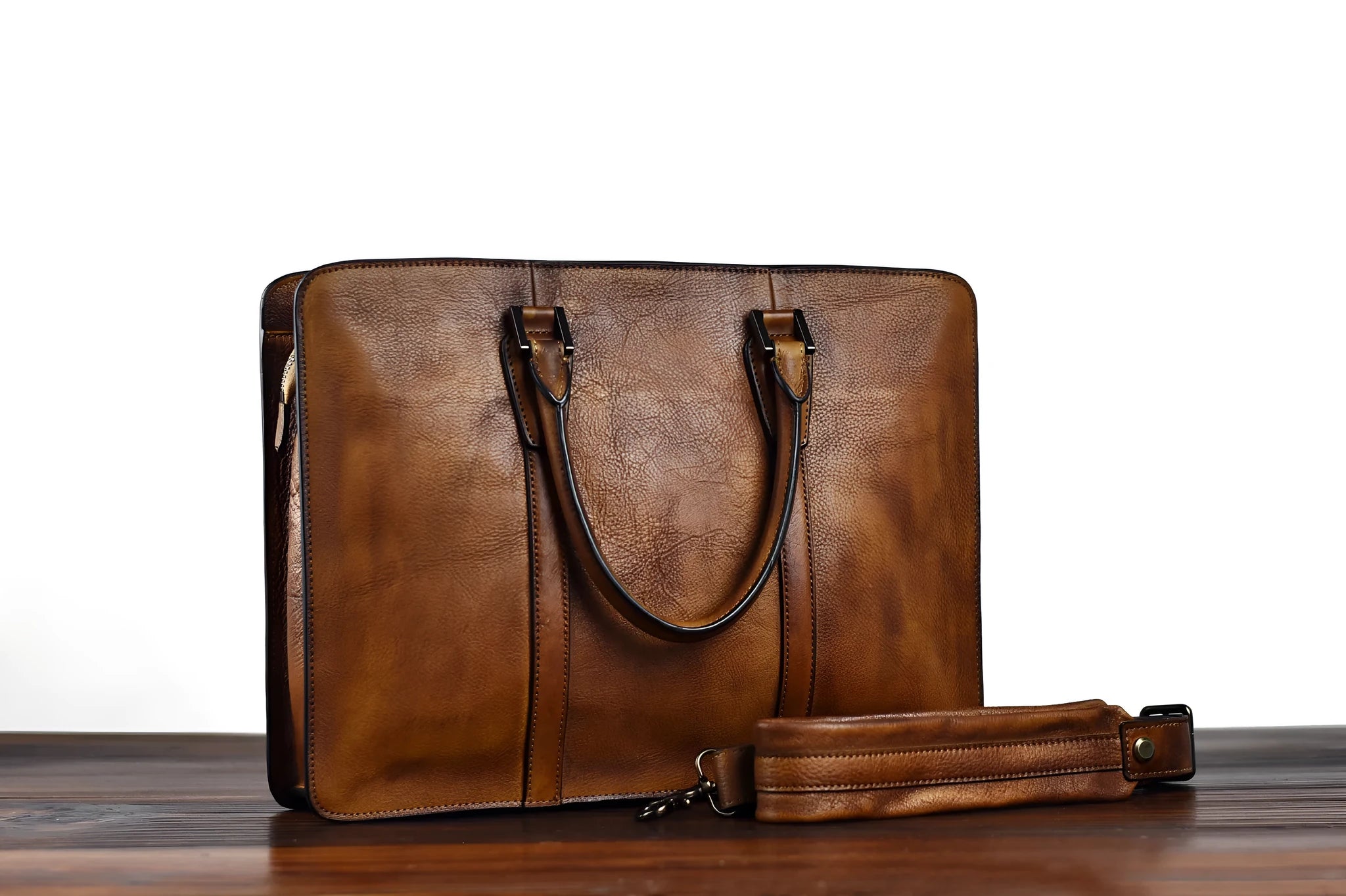 Men's brown leather business handbag with horizontal square shape and zipper closure
