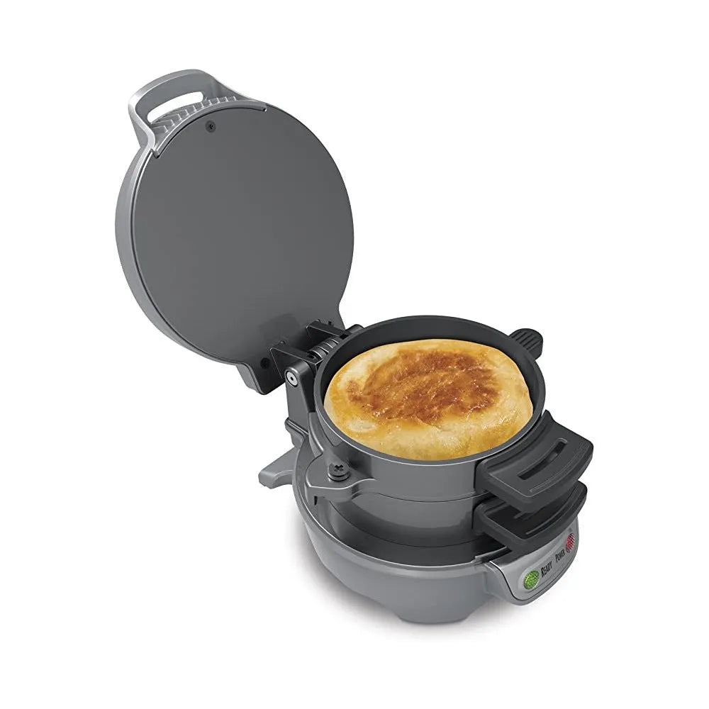 Bright red household breakfast sandwich maker with egg cooker ring and waffle plates on a kitchen counter.