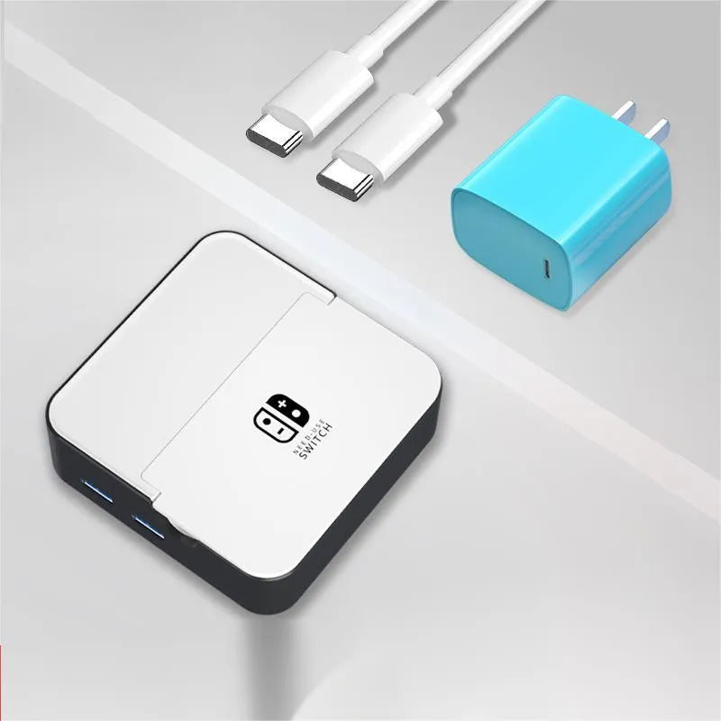 Portable game console rotary adapter with USB-C port in a silver PVC-aluminium housing.