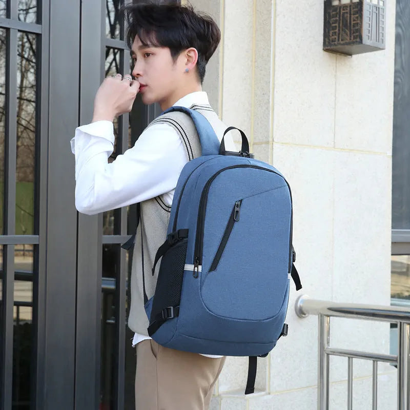 Street-style grey Oxford cloth computer backpack with 20-35 litre capacity for daily use.