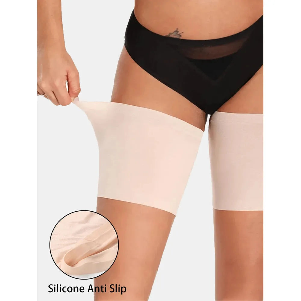 Women's anti-friction silicone thigh strap in black with adjustable nylon band on plain background