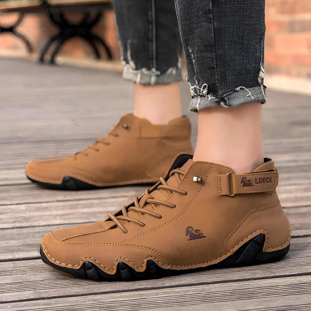 Men's khaki high top Octopus shoes with round toe and rubber sole on a white background.