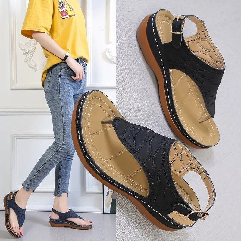 Women's casual wedge heel sandals with adjustable buckle strap in solid red colour