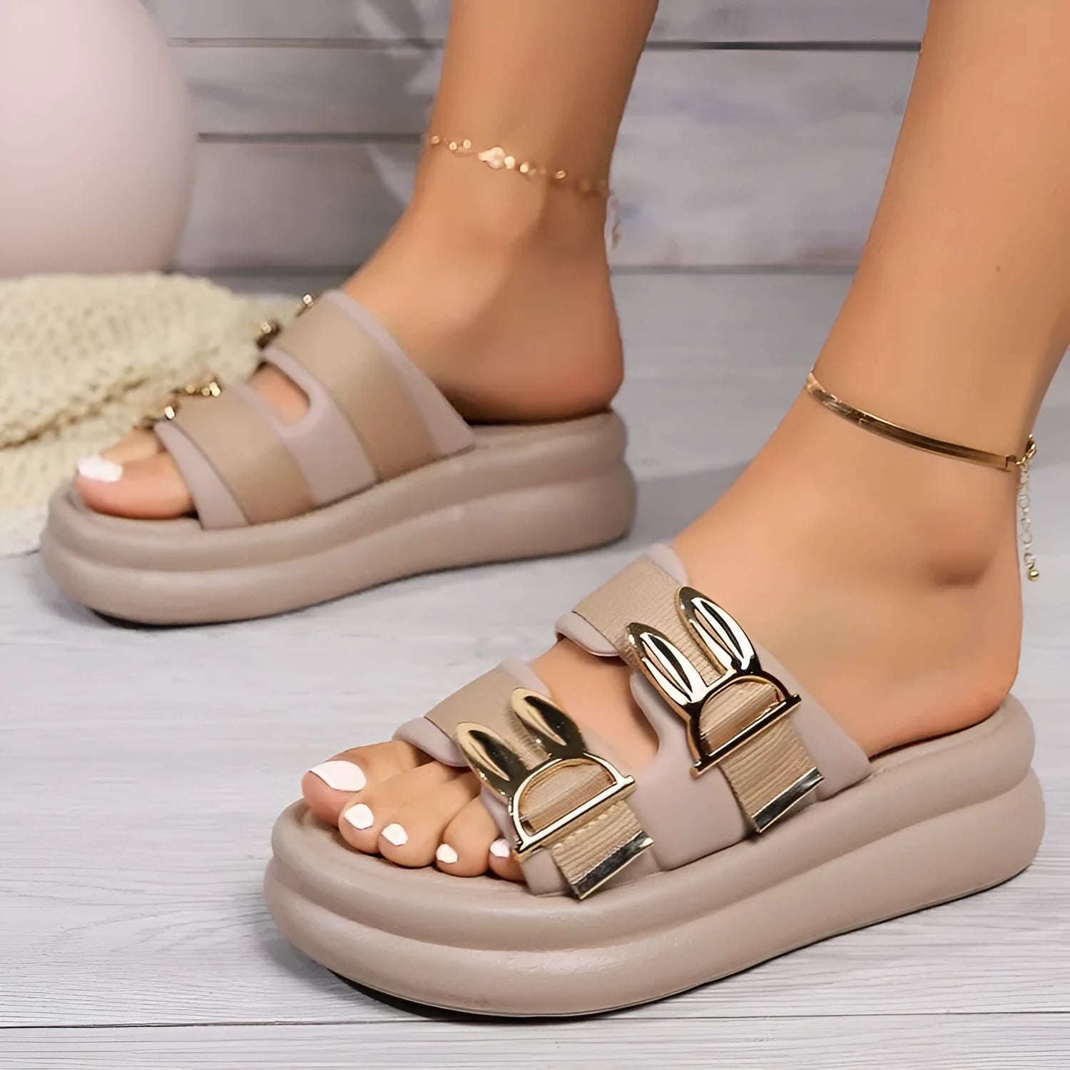 Women's thick sole slippers in apricot colour with suede uppers and rubber soles