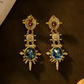 Gold geometric retro stud earrings with round design elements and diamond-treated alloy construction