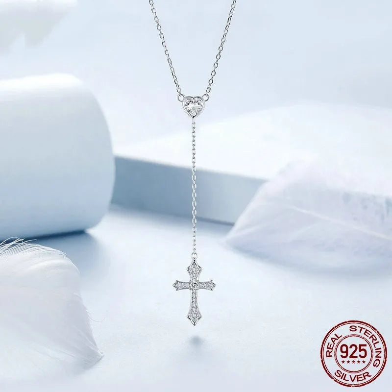 Simple silver love cross pendant on a V-neck O-ring chain, colour BSN384.