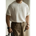 Women's casual gray pullover top with raglan sleeves and a terry texture fabric.