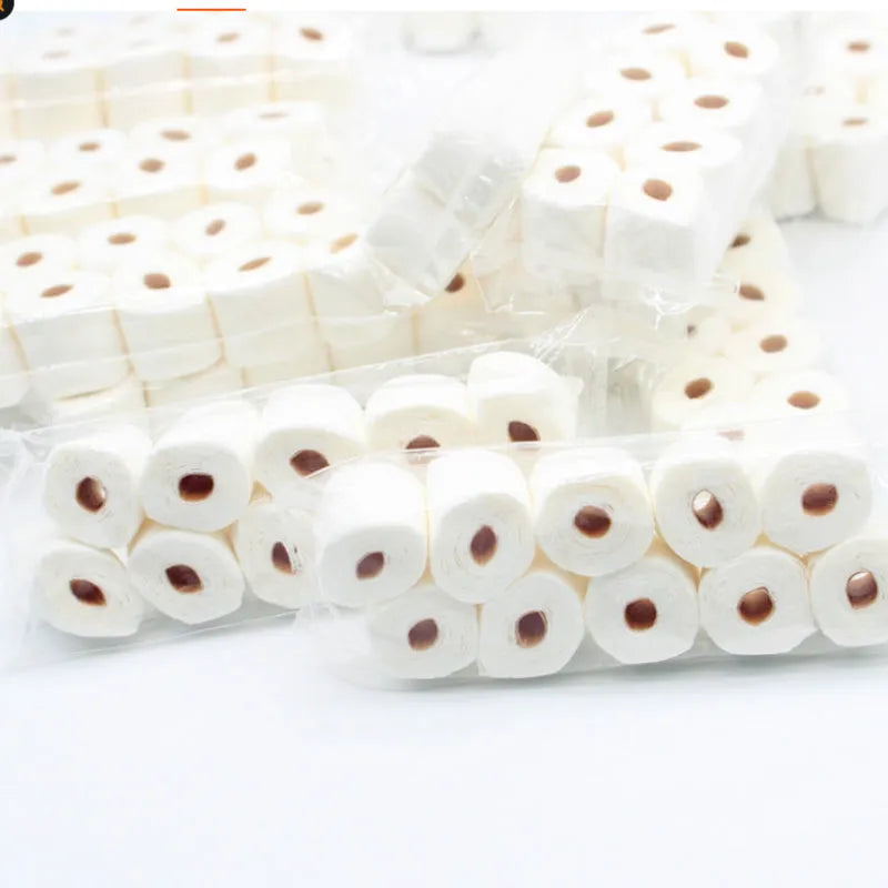 Miniature paper tissue roll model for dollhouse play measuring 30x15x80mm