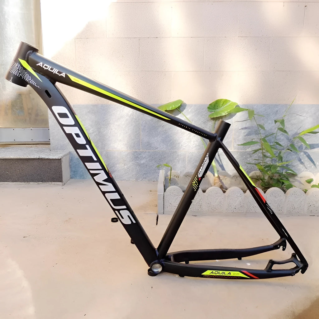 Black green aluminium 29-inch mountain bike frame showing innerline routing and disc brake mounts