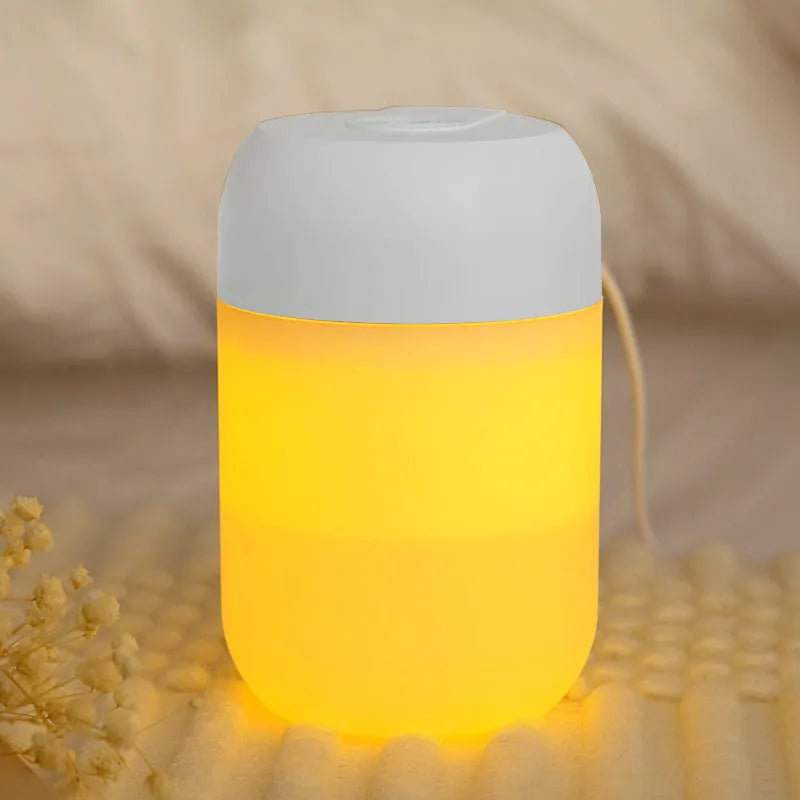 Small white cylindrical USB-powered humidifier with aromatherapy function