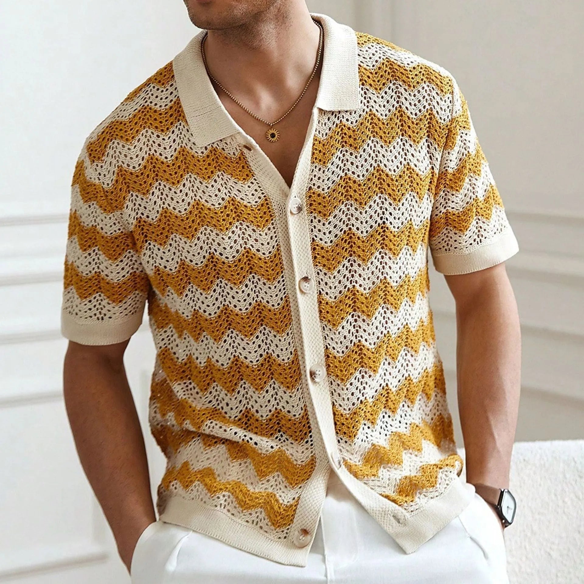 Yellow hollow jacquard corrugated short sleeve sweater with flocking detail on hanger