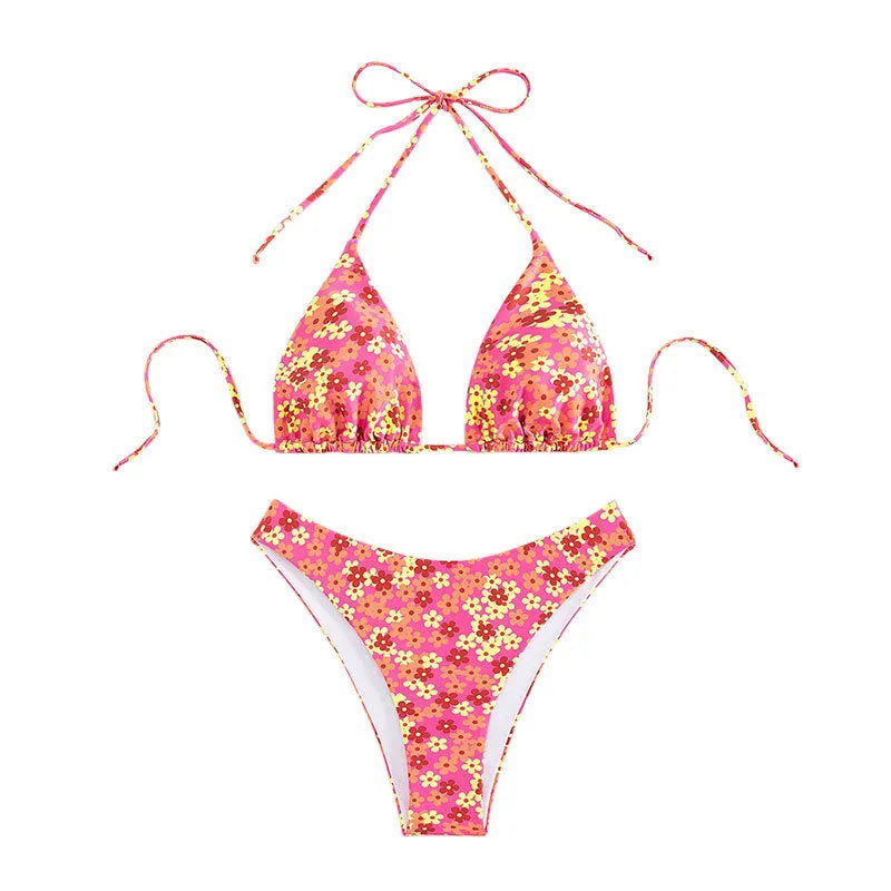 Women's blue printed swimsuit with lace-up front and high-leg split design