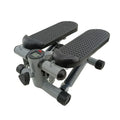 Silver grey mini treadmill waist slimming machine with hydraulic resistance and pedals.