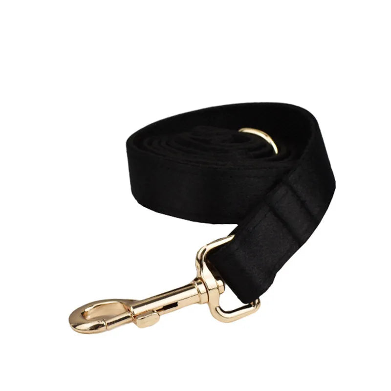 Cloth dog collar and leash set with matching vest and bow tie in four adjustable sizes