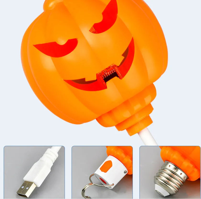 Plastic pumpkin-shaped decorative lamp with purple or yellow light, standing 22cm tall.