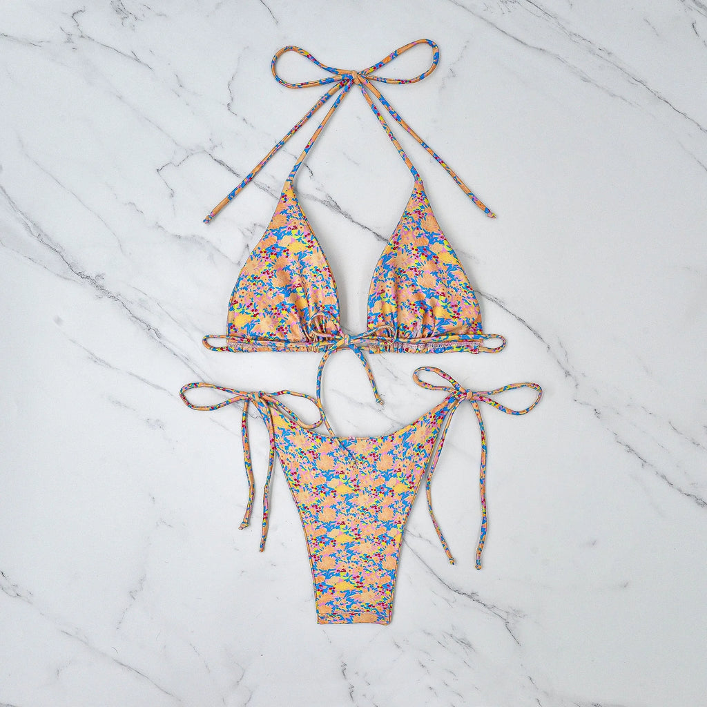 Women's lace-up bikini swimsuit with backless design and split briefs in polyester fabric
