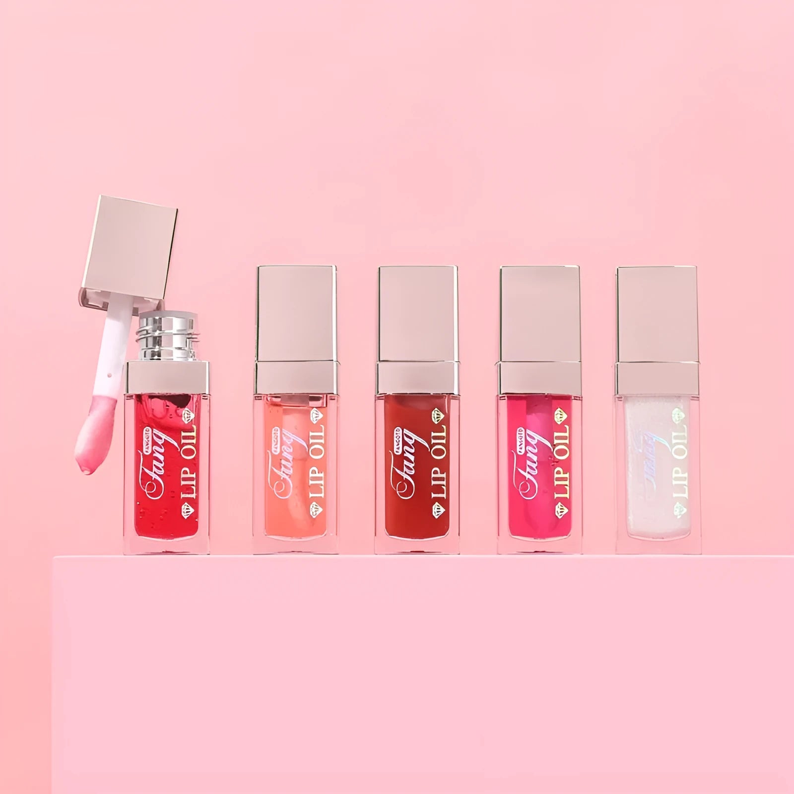 Bright Lip Gloss Mint Lipstick in five colour shades with included lip essence oil.